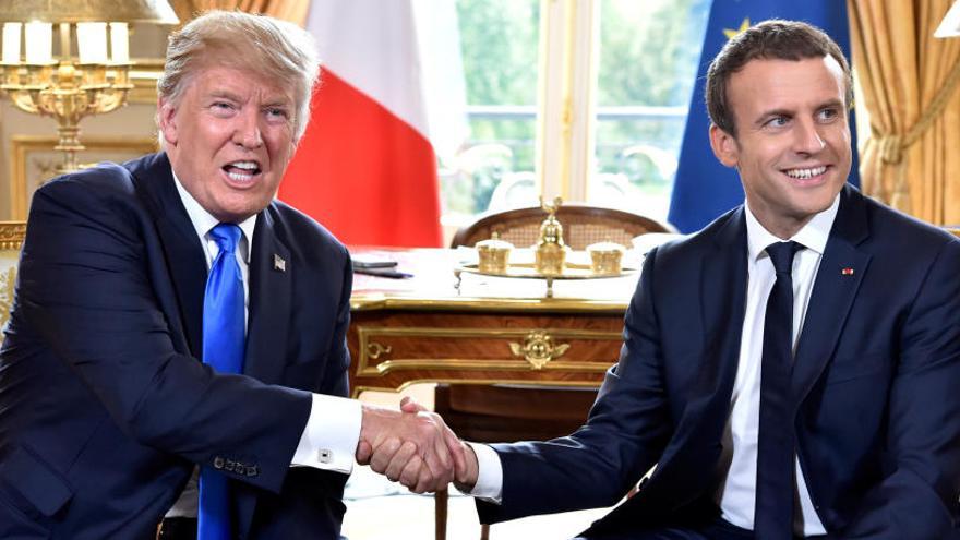 Trump junto a Macron durante su visita a París.