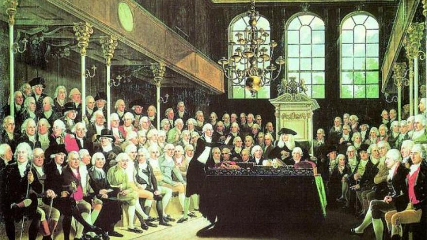 Una sesión de la Cámara de los Comunes de Inglaterra, en un lienzo anterior a 1808. George Canning es el noveno de la tercera fila, con levita verde.