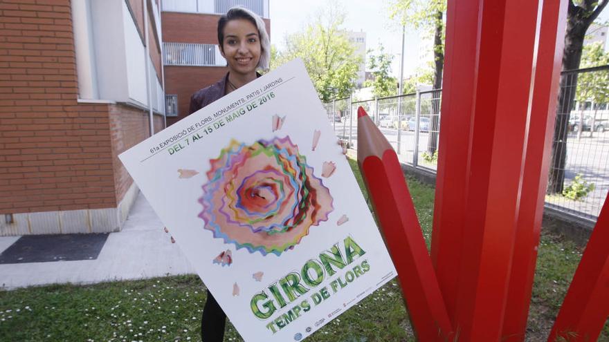 Una flor que surt d&#039;una maquineta de fer punta, cartell de Temps de Flors