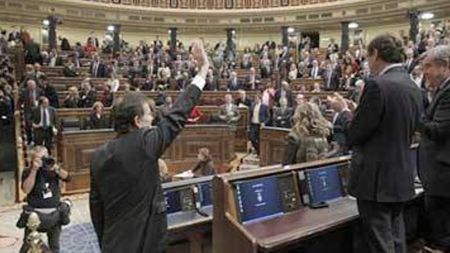 Rajoy sale del debate &quot;con ganas de llevar a España adelante&quot;