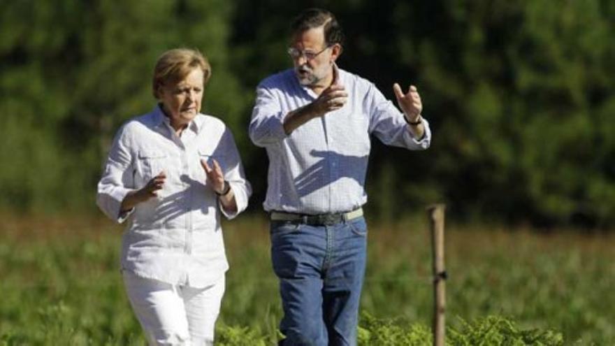 Merkel y Rajoy recorren un tramo del Camino de Santiago