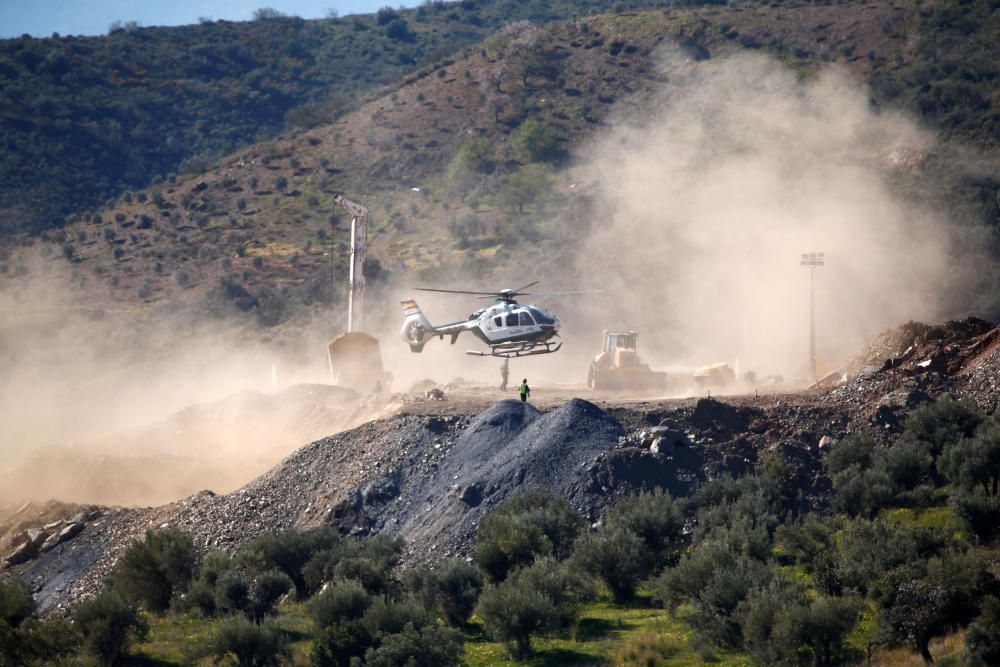 A Spanish Civil Guard helicopter lands carrying ...