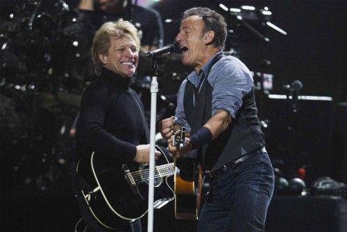 Singers Bon Jovi and Springsteen perform during the "12-12-12" benefit concert for victims of Superstorm Sandy at Madison Square Garden in New York