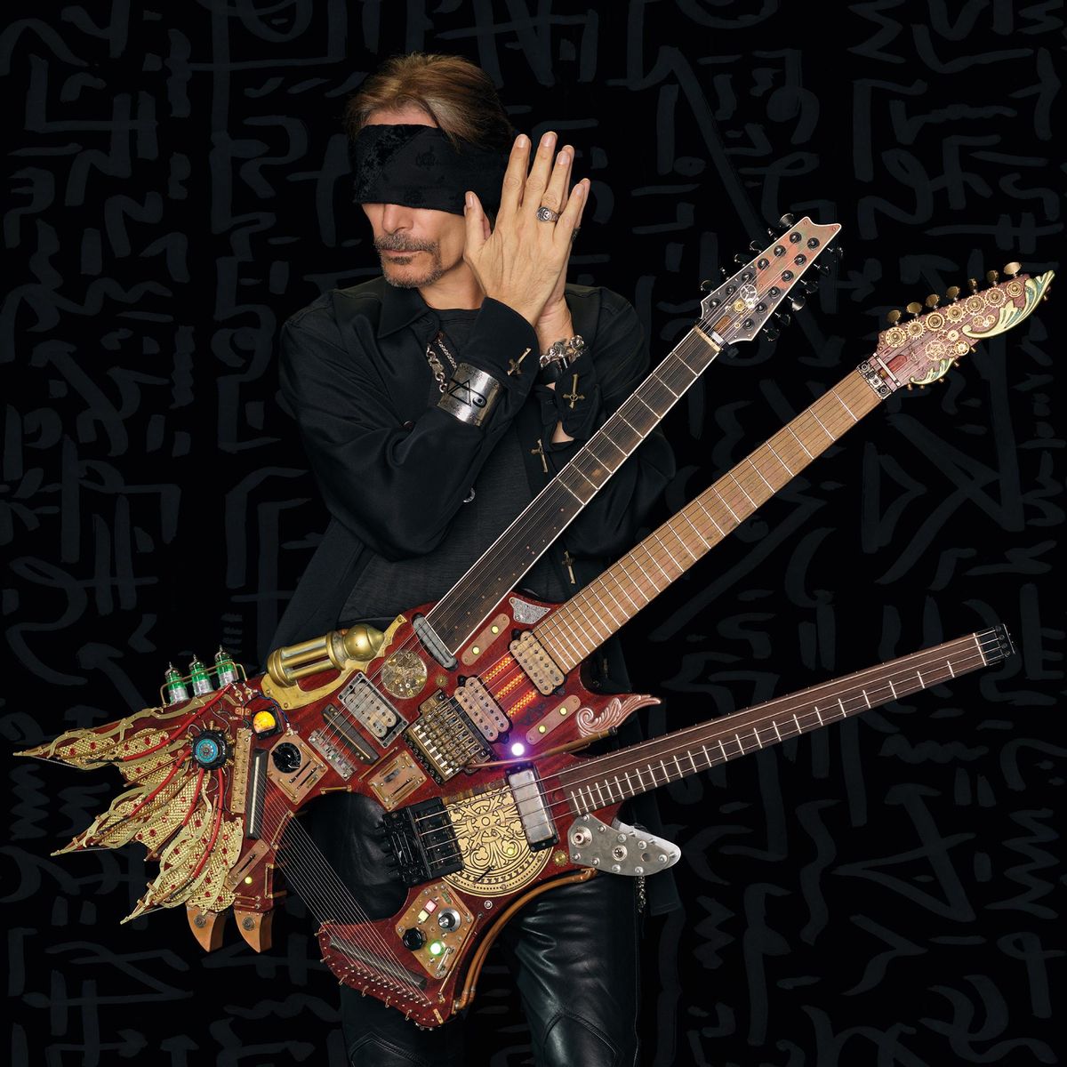 Vai con su nueva creación: una guitarra de tres mástiles.