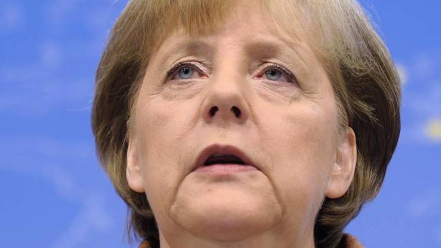 Berlín niega un pacto de Merkel con conservadores europeos para no recibir a Hollande