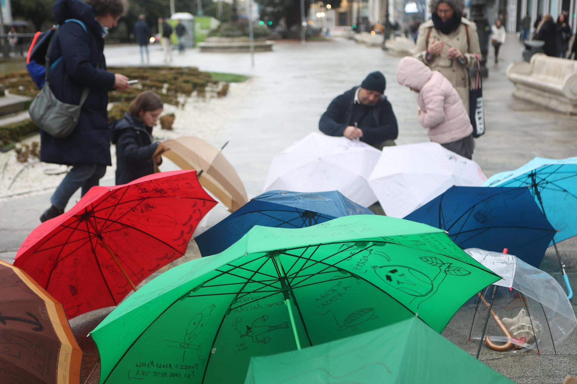 Pintada de paraguas en honor a Urbano Lugrís