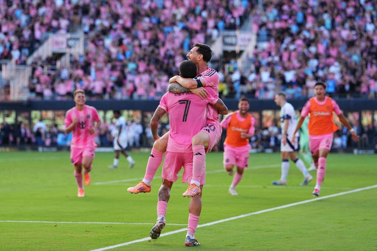 FORT LAUDERDALE, FLORIDA - DECEMBER 06: Rodrigo De Paul #7 of Inter Miami CF celebrates with teammate Lionel Messi #10 after scoring the team's second goal during the Audi 2025 MLS Cup Final match between Inter Miami CF and Vancouver Whitecaps FC at Chase Stadium on December 06, 2025 in Fort Lauderdale, Florida. Rich Storry/Getty Images/AFP (Photo by Rich Storry / GETTY IMAGES NORTH AMERICA / Getty Images via AFP)