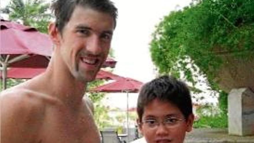 Michael Phelps i un jove Schooling fa vuit anys als Jocs de Pequín