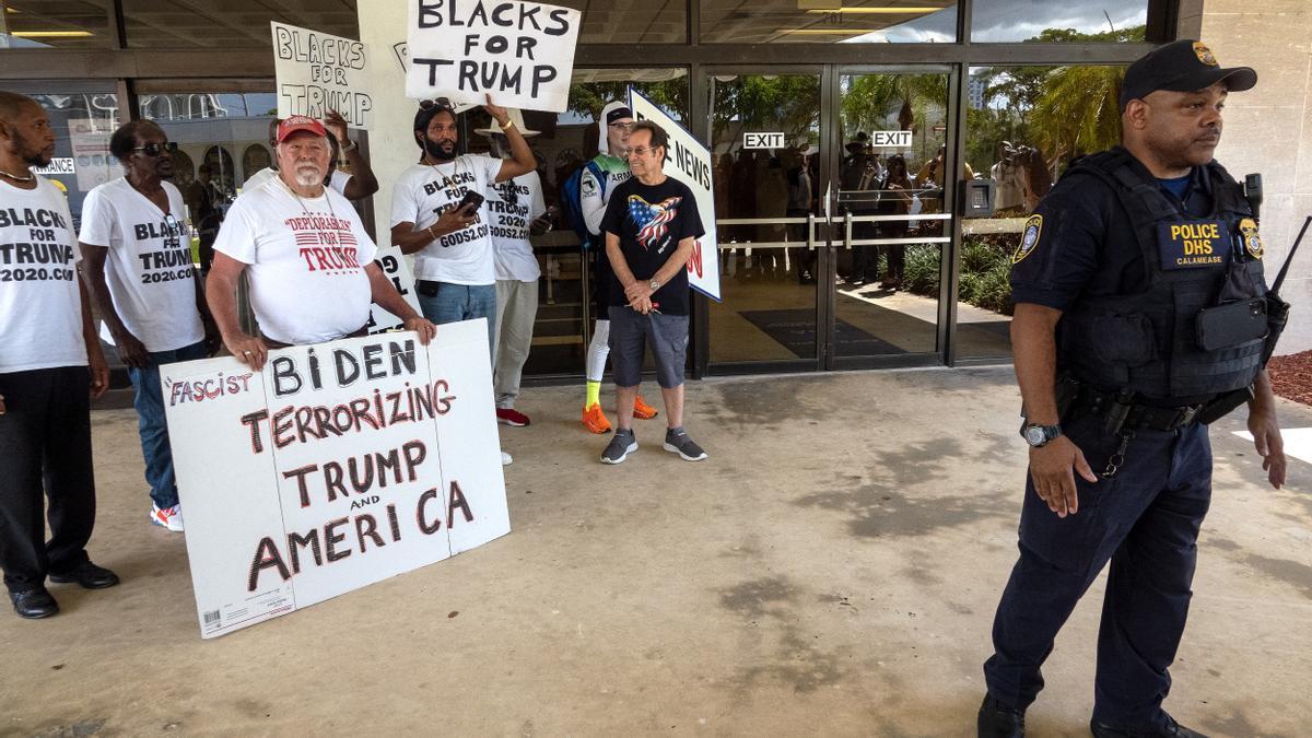 Protestors and police gather outside Florida courthouse related to Trump inquiry