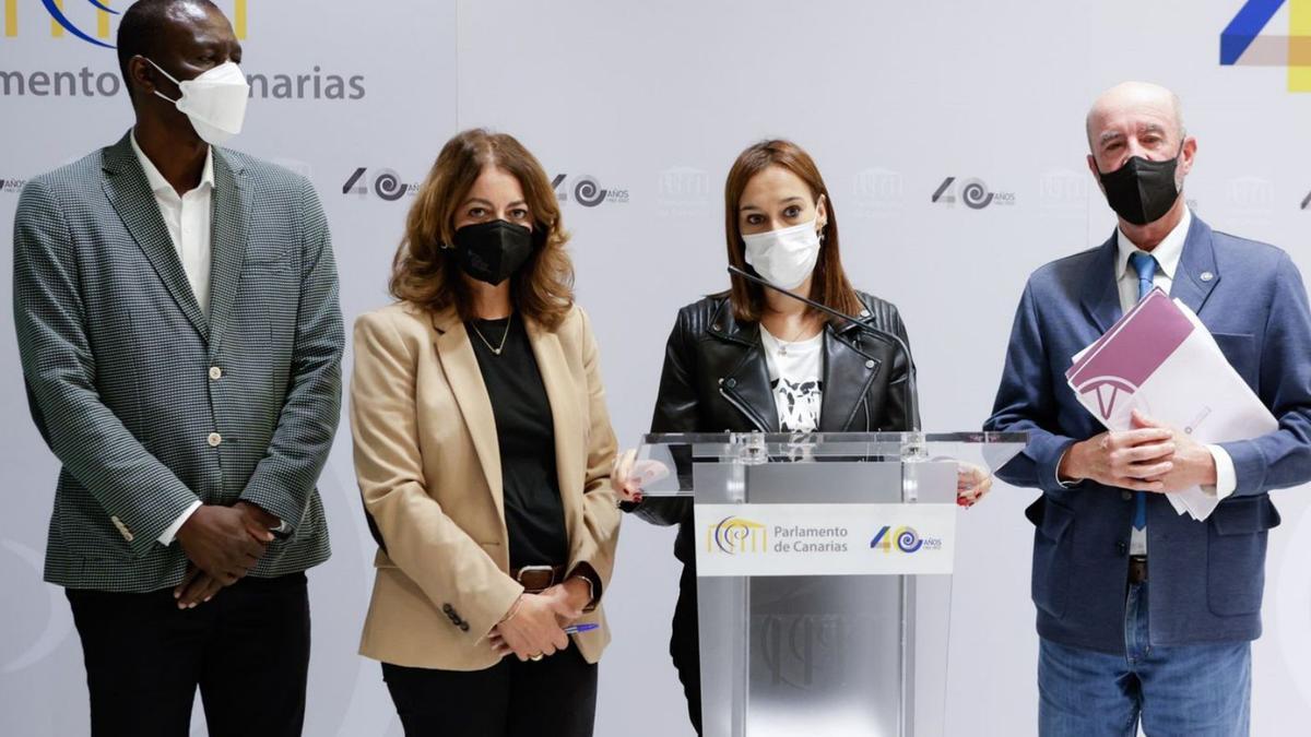 Luc André Diouf, Tmara Raya, Nira Fierro y Santiago Pérez ayer en la rueda de prensa de defensa de  los presupuestos. | | EUROPA PRESS