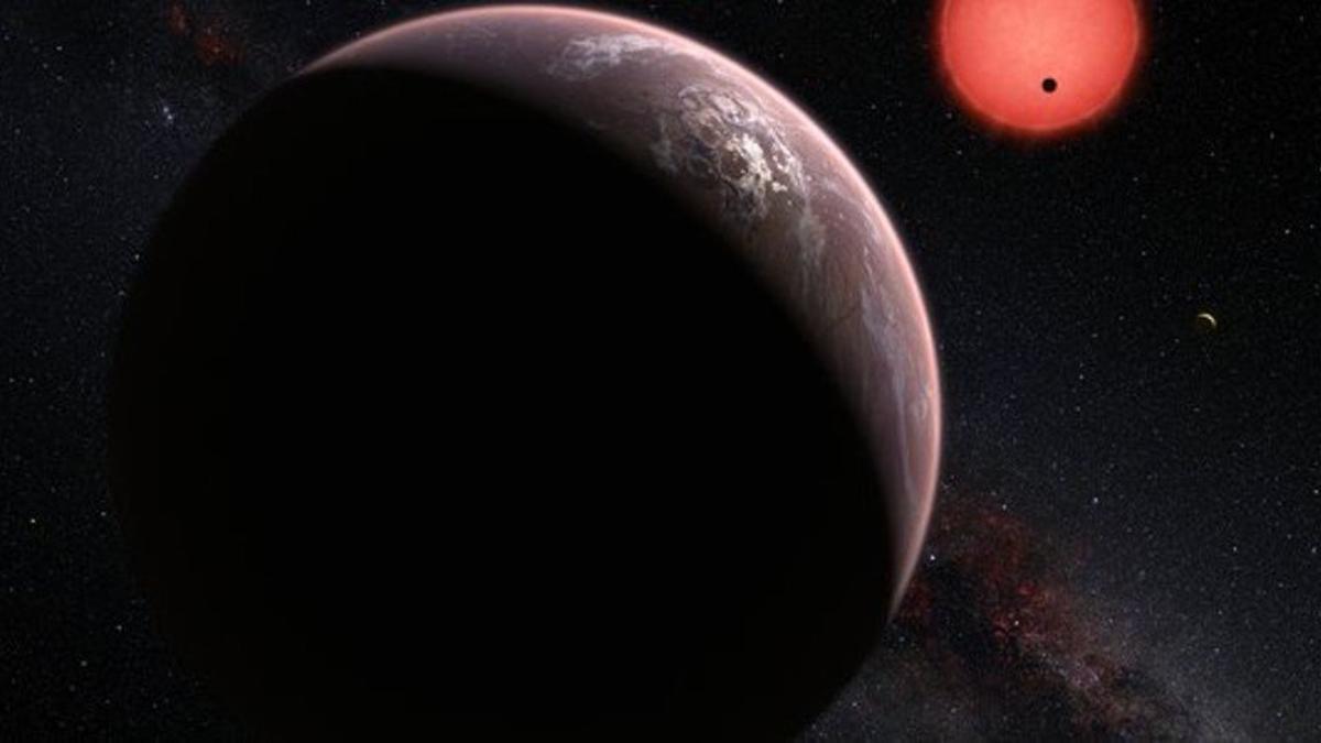 Ilustración de la estrella enana ultrafría TRAPPIST-1 y de sus tres planetas