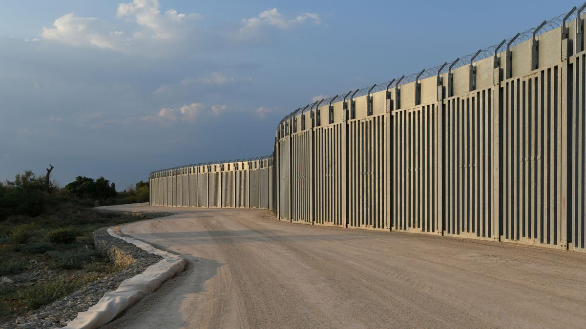 FILE PHOTO: View of a border fence between Greece and Turkey, in Alexandroupolis