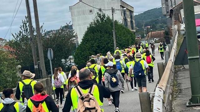 Vecinos de Vilanov,a en plena peregrinación a Compostela.