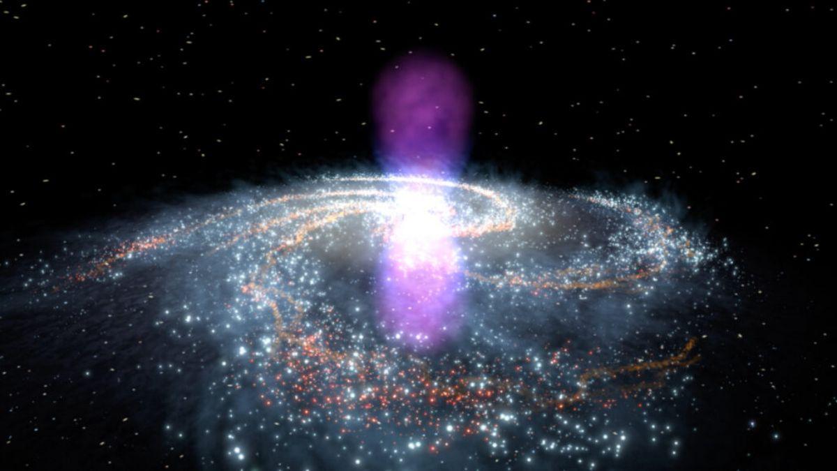 Dos enormes burbujas de gas, que se muestran en azul y violeta en esta ilustración, se extienden desde el centro de la Vía Láctea. Los científicos creen que han detectado positrones, las contrapartes de antimateria de los electrones, que provienen de un gigantesco estallido, ocurrido hace varios millones de años, que habría producido estas extrañas estructuras.