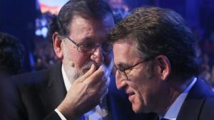 Mariano Rajoy y Alberto Núñez Feijóo, el 18 de enero de 2019, en la convención nacional del PP que organizó Pablo Casado en Madrid.