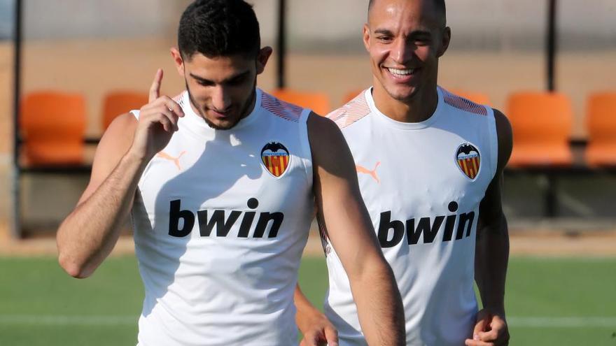 Guedes y Rodrigo, en el entrenamiento en Paterna.