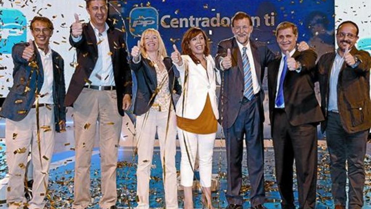 Imagen de archivo donde, a la izquierda, se ve Juan Carlos del Río, en aquel entonces alcaldable del PP en L'Hospitalet junto con Xavier García Albiol, candidato popular en Badalona.