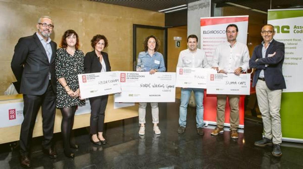 Els guanyadors i els organitzadors en l'acte de lliurament al Parc Científic de Girona.