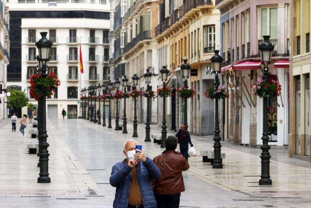 Calles vacías e inhóspitas en lo que era un Centro de Málaga bullicioso y lleno de actividad.