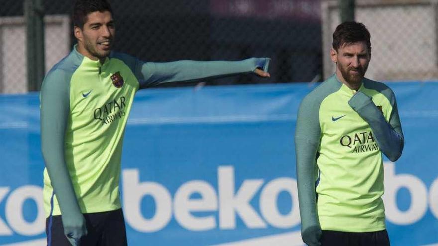 Suárez y Messi, durante el entrenamiento de ayer. // Efe