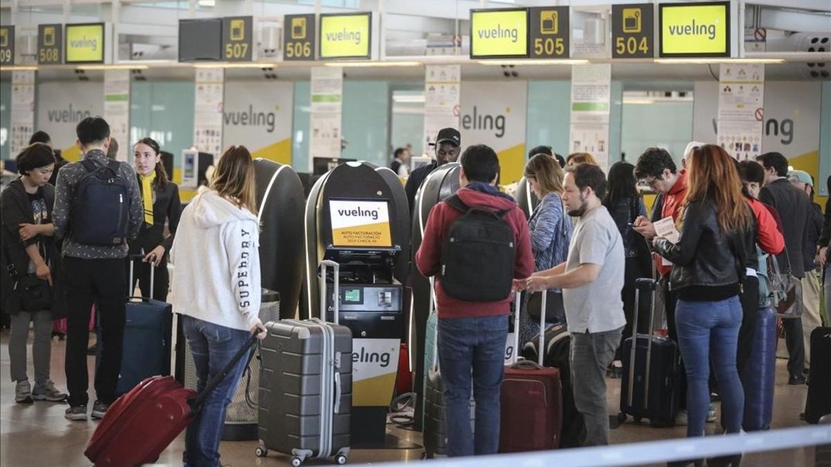 Colas de facturación de Vueling en el aeropuerto de El Prat