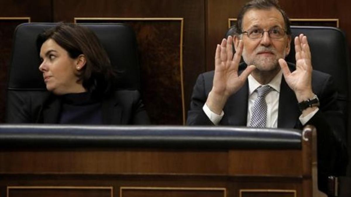 Sáenz de Santamaría y Rajoy, el miércoles, en el debate de investidura.