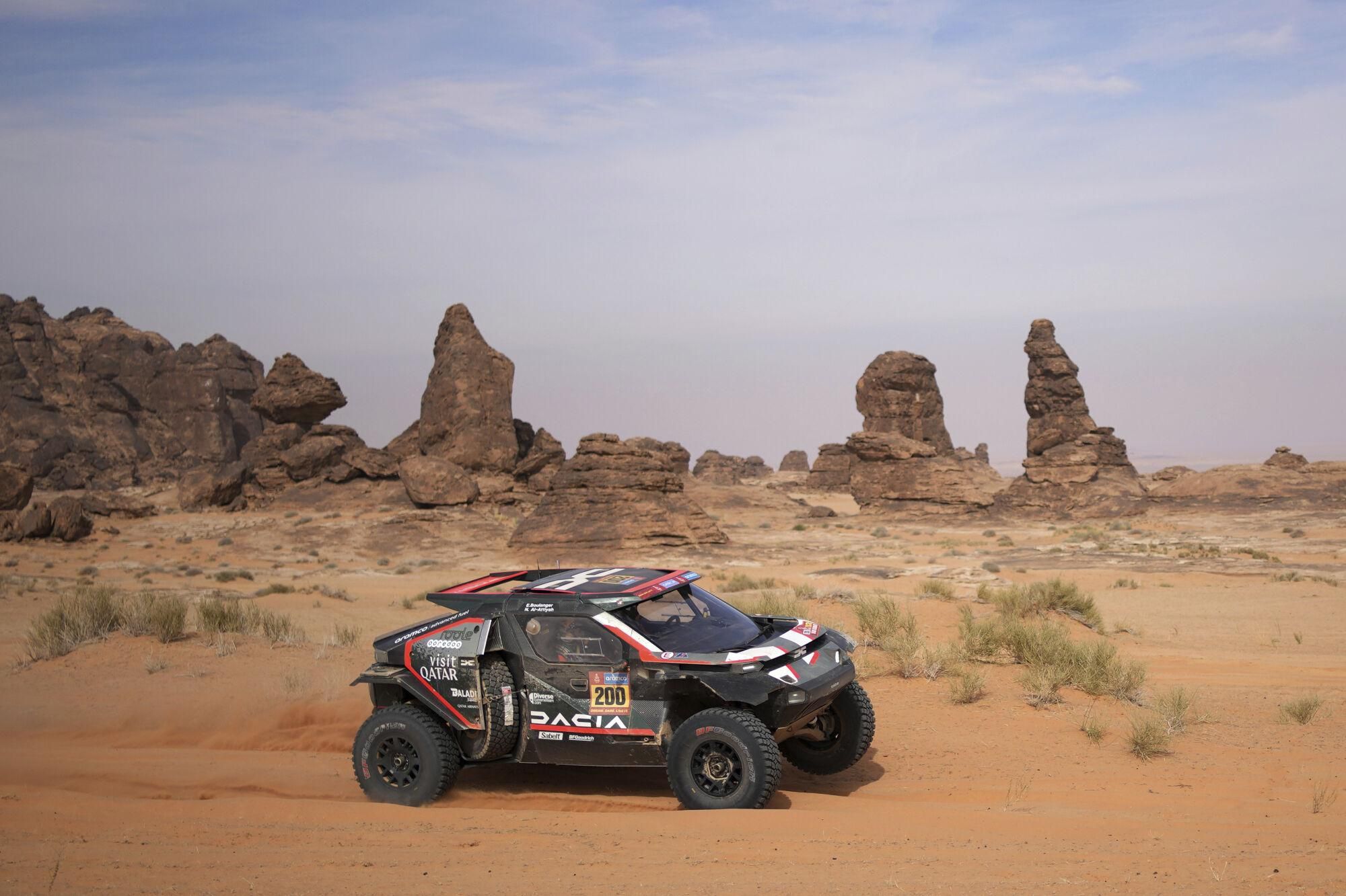 Daccia driver Nasser Al-Attiyah and co-driver Edouard Boulanger compete during the fifth stage of the Dakar Rally between Alula and Hail, Saudi Arabia, Thursday, Jan. 9, 2025. (AP Photo/Christophe Ena). EDITORIAL USE ONLY / ONLY ITALY AND SPAIN