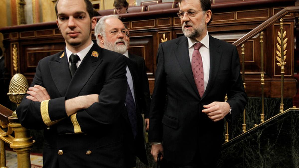 Rajoy junto Arias Cañete, durante la sesión de control al Gobierno.