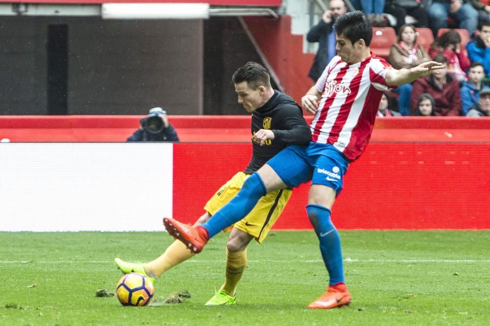 El partido entre el Sporting y el Atlético de Madrid, en imágenes