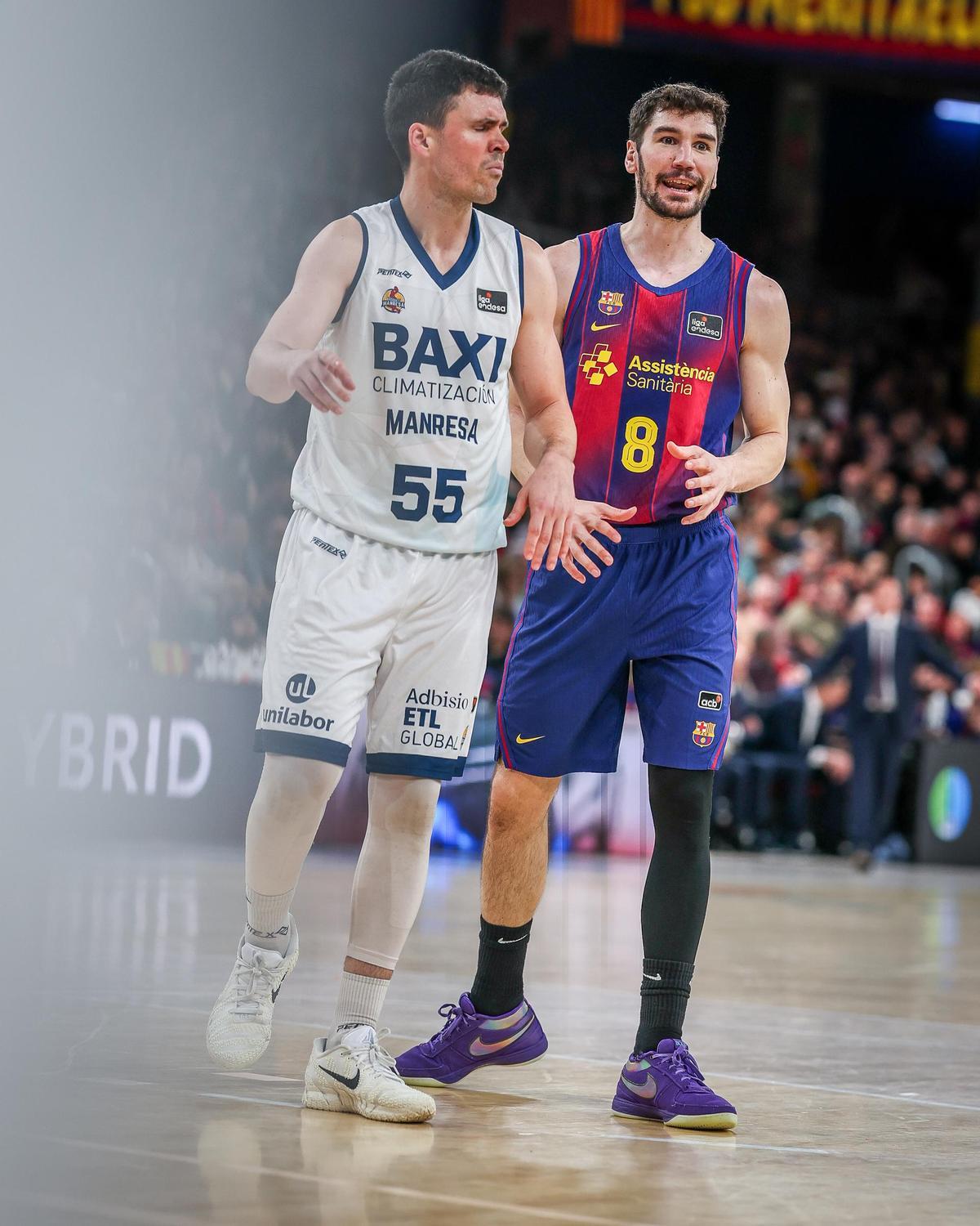 Dani Pérez, amb Darío Brizuela durant el partit