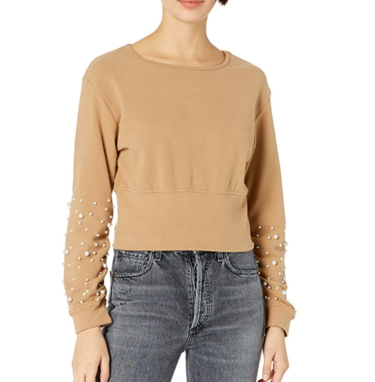 Sudadera con detalles de perlas y efecto 'cut-out' en la espalda (Precio: 52,51 euros)