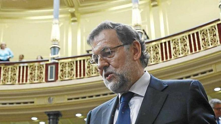 Mariano Rajoy amb Soraya Sáenz de Santamaría, ahir al Congrés