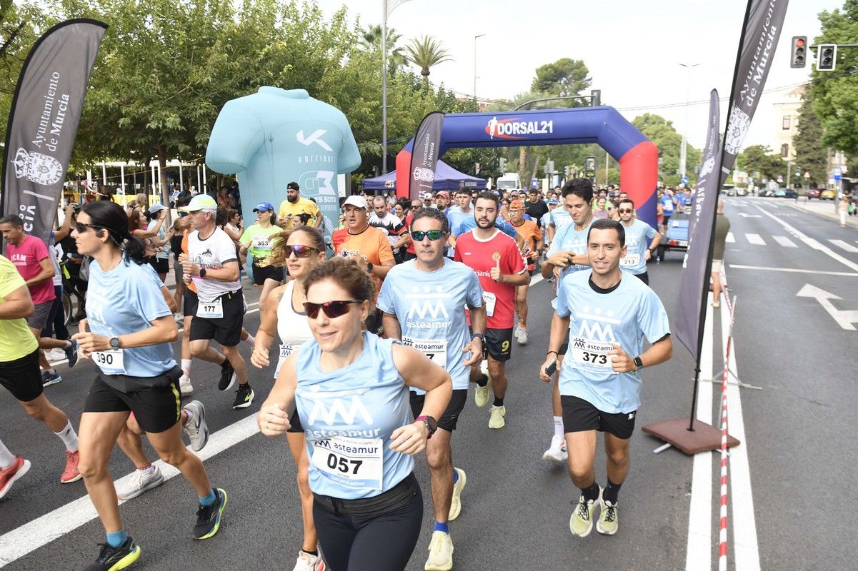 La carrera y marcha Solidaria Asteamur, en imágenes