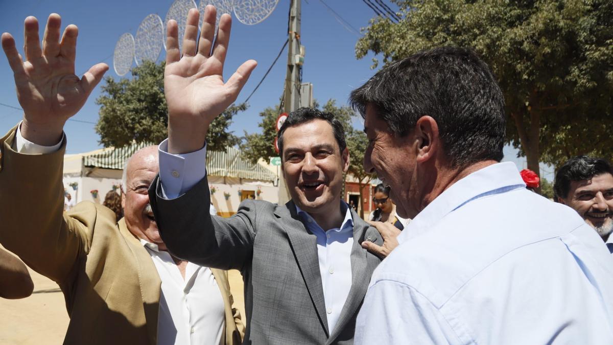 Jesús Aguirre, Juanma Moreno y Juan Marín, hoy en la Feria de Córdoba.