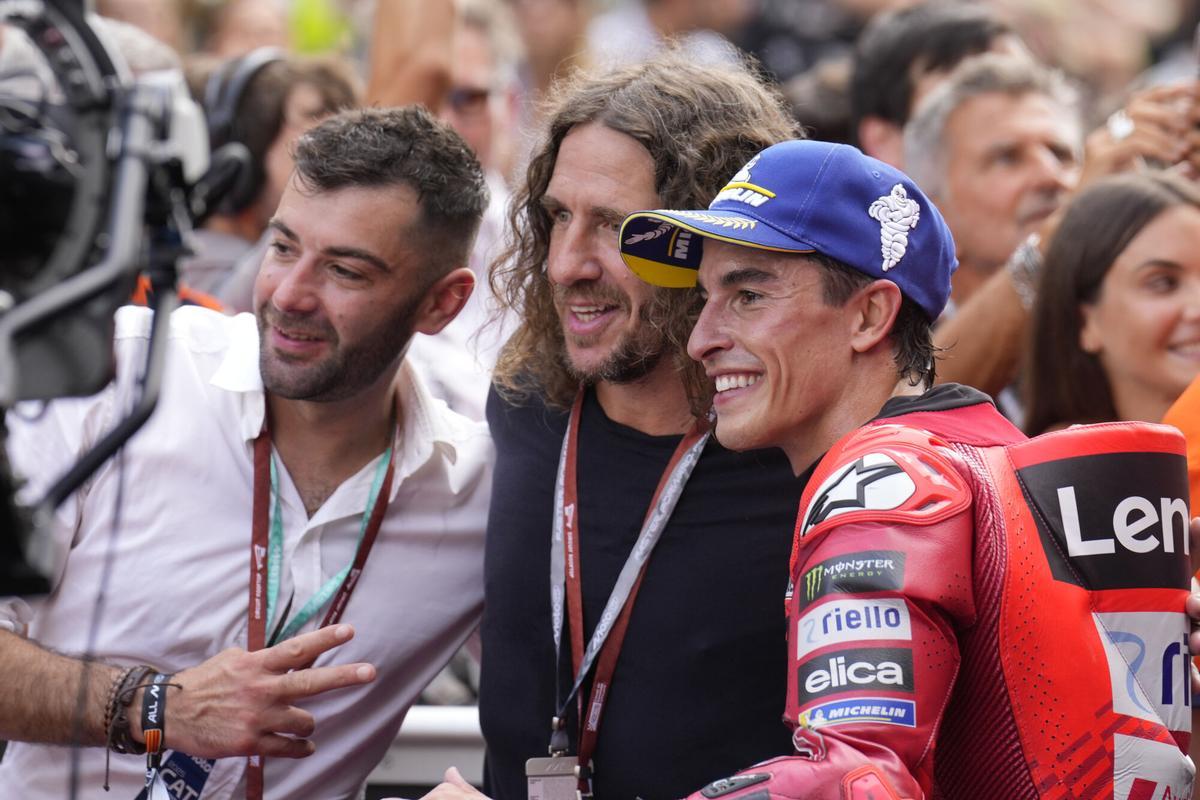 Carles Puyol, junto a Marc Márquez