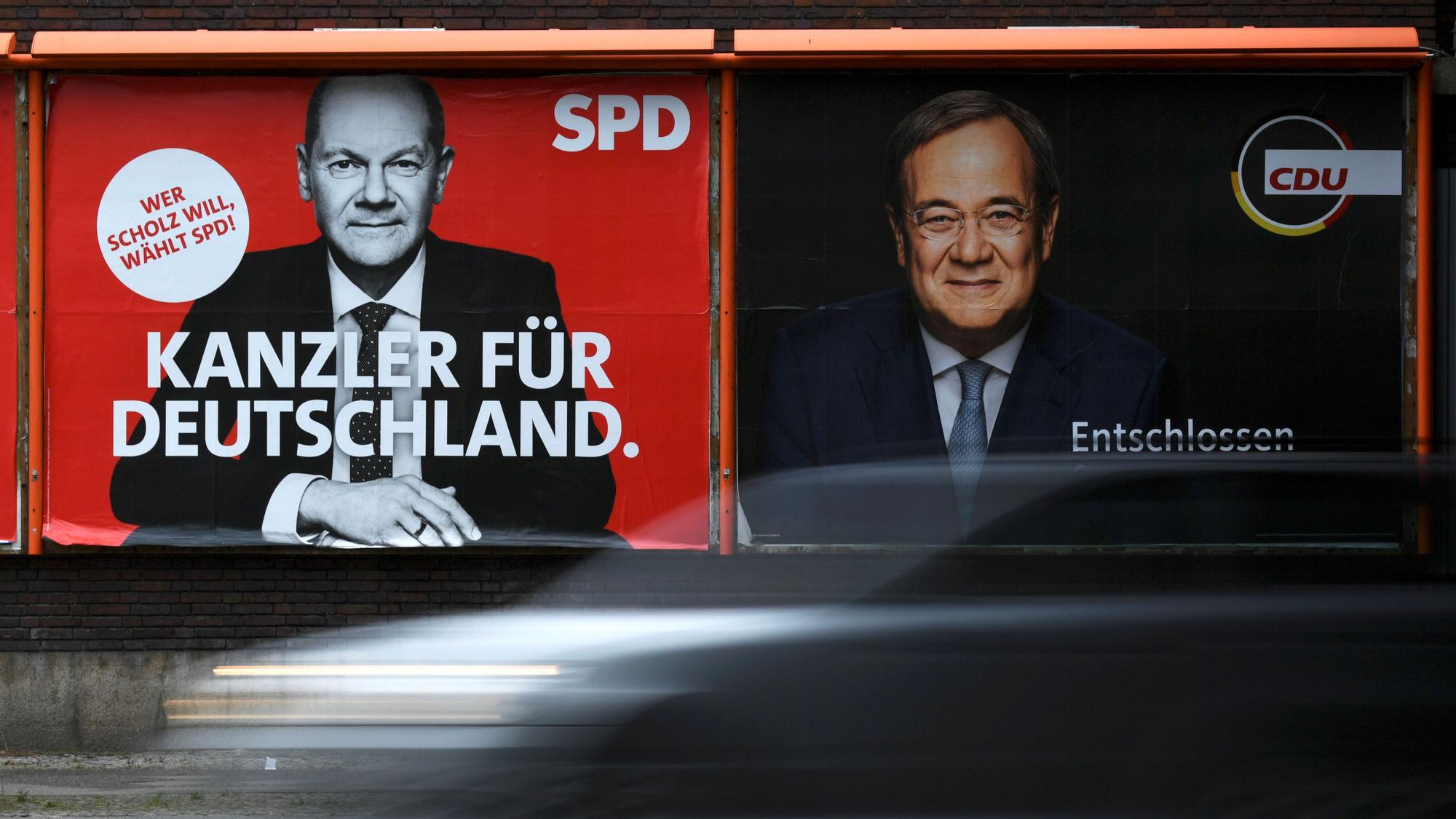 An election campaign billboard, featuring SPD's Olaf Scholz and CDU's Armin Laschet is pictured in Berlin