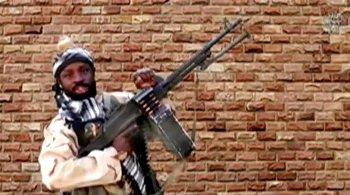 FILE PHOTO  The leader of one of the Boko Haram group s factions  Abubakar Shekau  holds a weapon in an unknown location in Nigeria in this still image taken from an undated video obtained on January 15  2018  Boko Haram Handout Sahara Reporters via REUTERS ATTENTION EDITORS - THIS IMAGE WAS PROVIDED BY A THIRD PARTY  MANDATORY CREDIT  File Photo