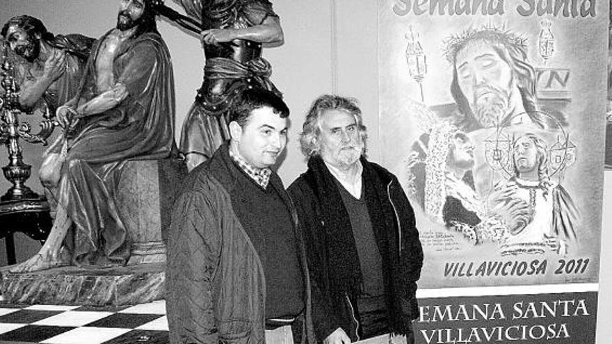 Nicolás Rodríguez y Juan Jurado, con el cartel de la Semana Santa, ayer, en Villaviciosa.