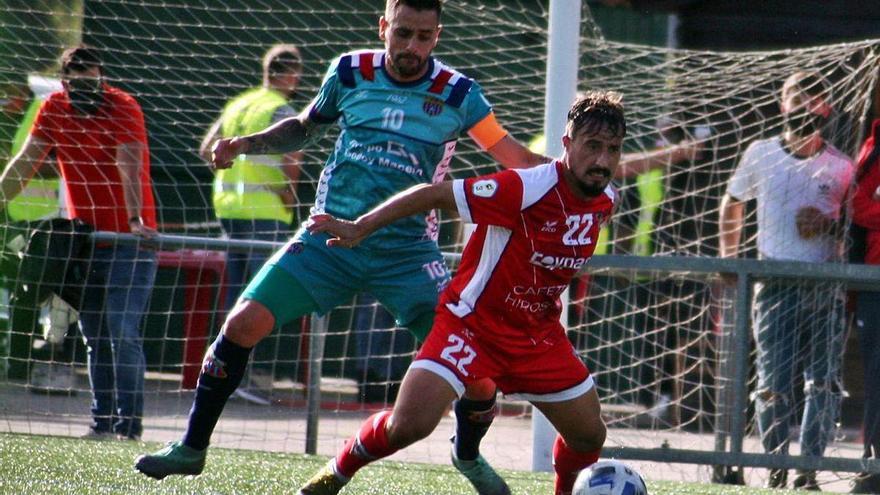 Imagen del partido jugado ayer en el campo del Atios.