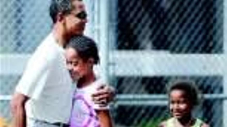 Obama dice que será presidente por sus hijas