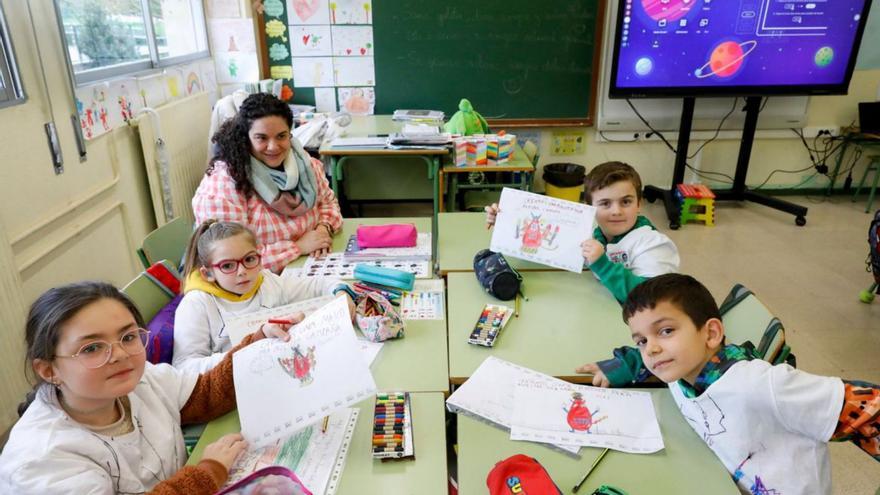 El colexu Noega vístese de bata blanca