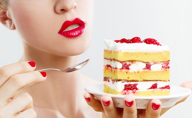 eating a strawberry cake