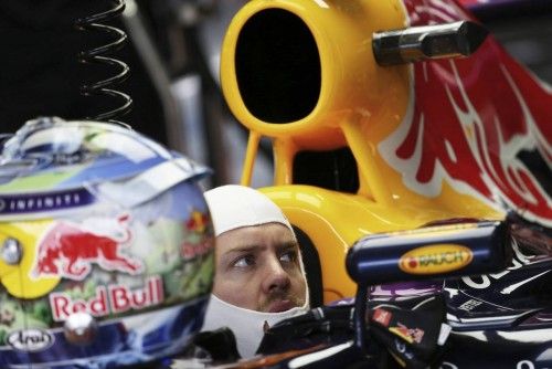 Red Bull Formula One driver Vettel prepares for the first free practice session ahead of the Brazilian F1 Grand Prix at the Interlagos circuit in Sao Paulo