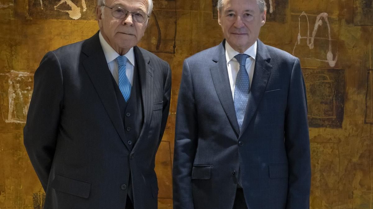 Fainé, izquierda, con Simón.
