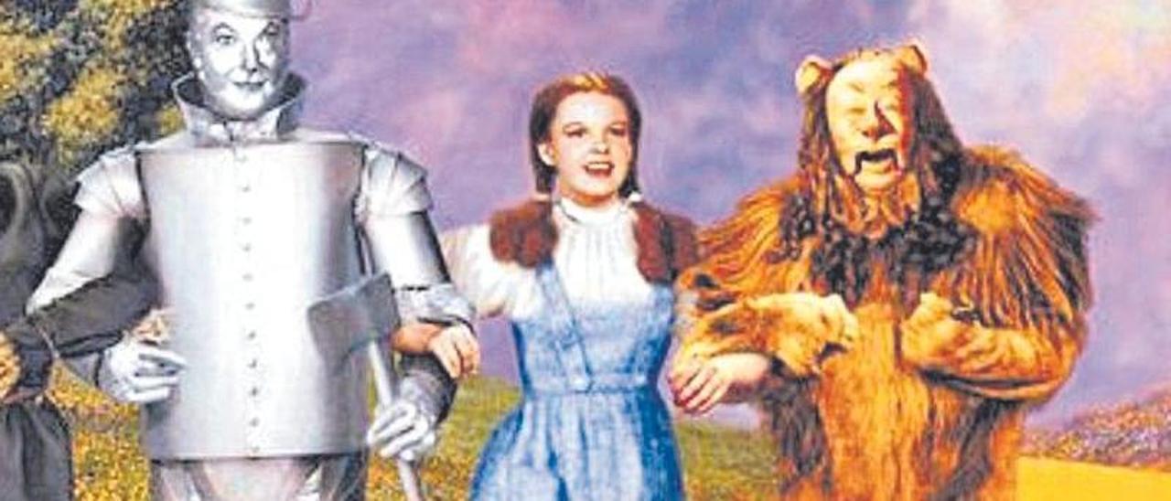 Dorothy y sus amigos en el camino de las baldosas amarillas.