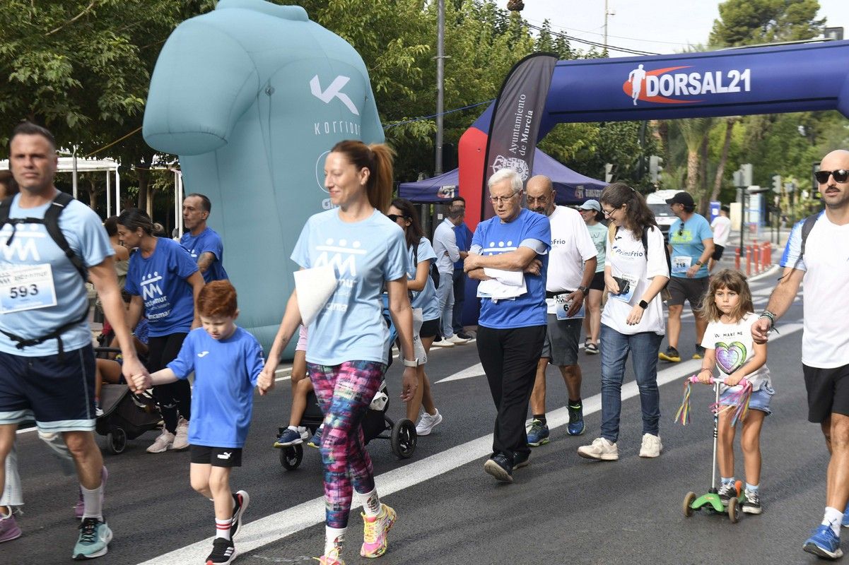 La carrera y marcha Solidaria Asteamur, en imágenes