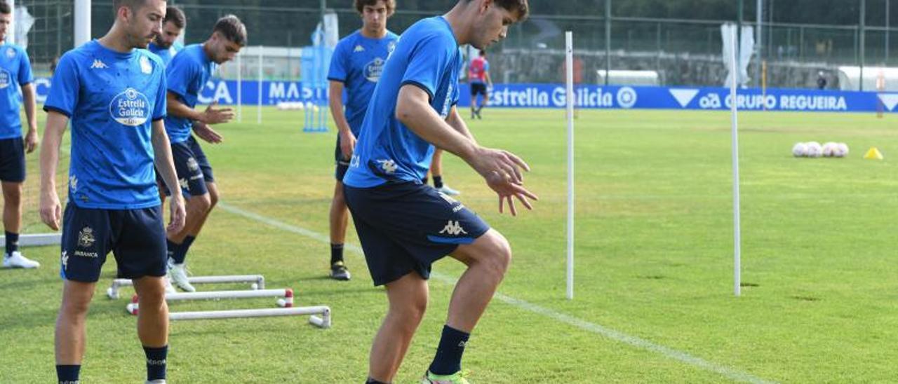 Rubén Díez y Trilli, ayer en el entrenamiento en Abegondo. |  // ARCAY / ROLLER AGENCIA