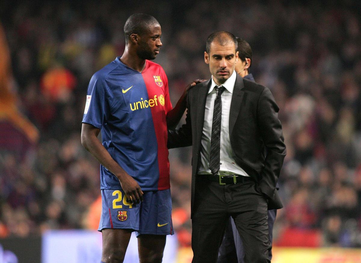 Yaya Touré y Pep Guardiola, en el Barça