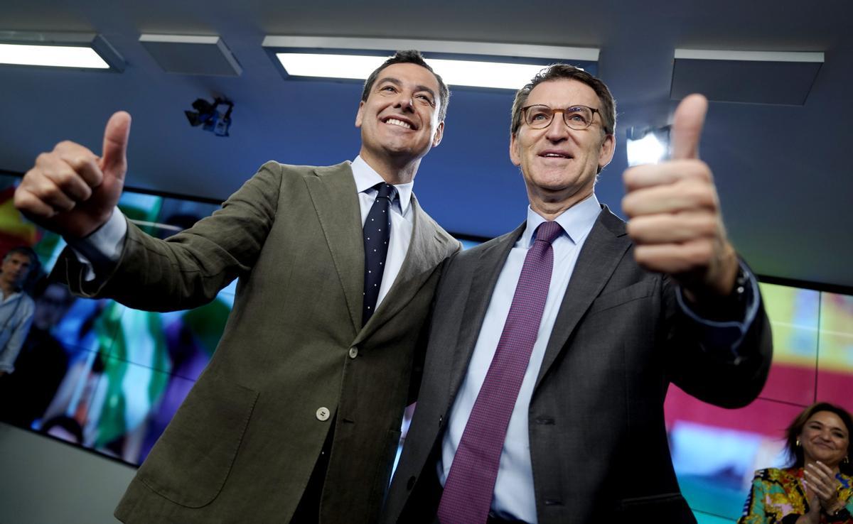 Alberto Núñez Feijóo y Juan Manuel Moreno a la llegada de la junta directiva nacional del Partido Popular.