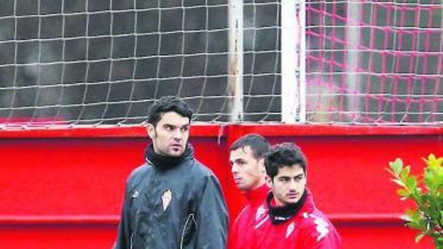 Juan Pablo, Carmelo y Nacho Cases, durante el entrenamiento de ayer.